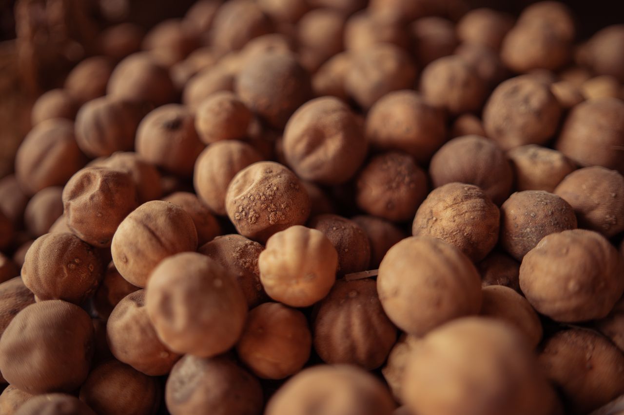 A detailed image of dried limes, often used in Middle Eastern cooking, showcasing texture.